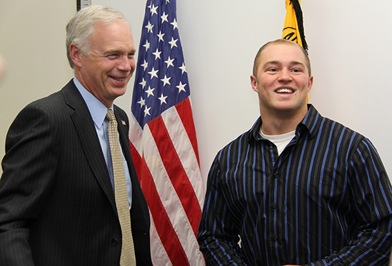 Ron Johnson and UW-L student Tyler Hyde smiling. 