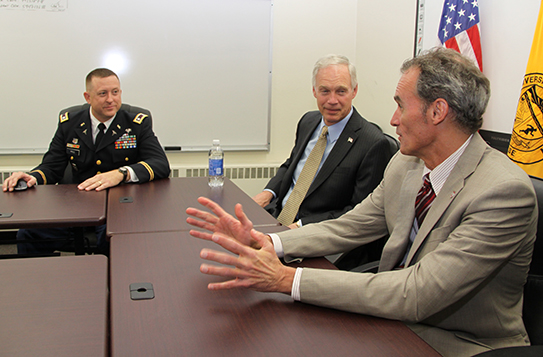 From left, UW-L’s ROTC Battalion Commader Lt. Col. James Hill, Wisconsin U.S. Sen. Ron Johnson and UW-L Chancellor Joe Gow sit around the table during a visit Johnson made to campus Nov. 8.