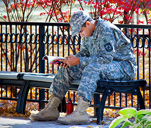 Photo of ROTC cadet studying. 