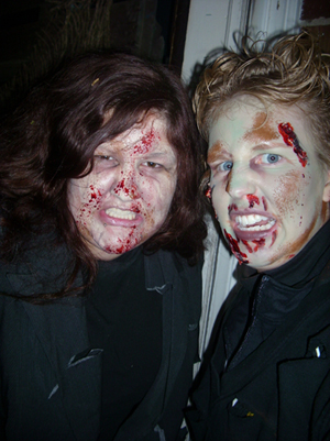 Members of Alpha Phi Lindsey Eigner, left, and Toria Kucera, dress up as zombies and scare people at the House of Shadows, a haunted house in Sparta. Eigner is a UW-L sophomore and Kucera is a senior. 