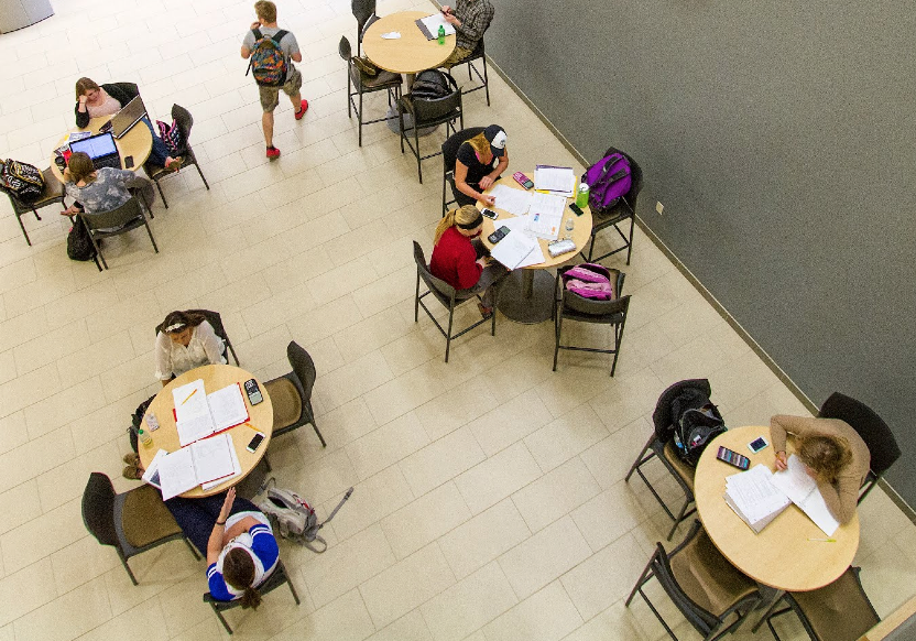 Image of students studying at tables in Centennial Hall.