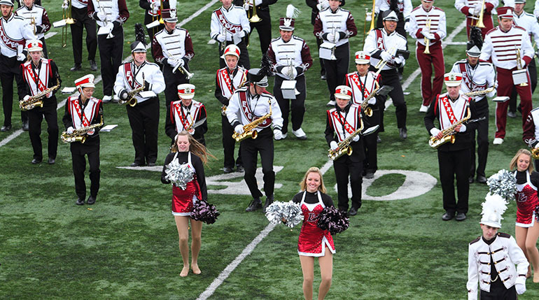 Screaming Eagles Marching Band and others performing. 