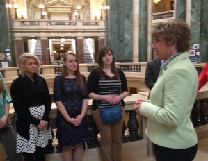 Image of State Sen. Jennifer Shilling talking to UW-L students at the state capitol.