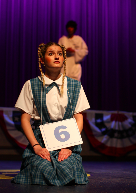 Image of a speller sitting on the floor. 