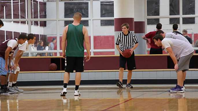 Freshman referee Jake Seifert prepares to proceed with a free throw during an intramural basketball game.
Read more →
