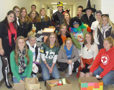 TrickOrTreat Group shot with food collected.