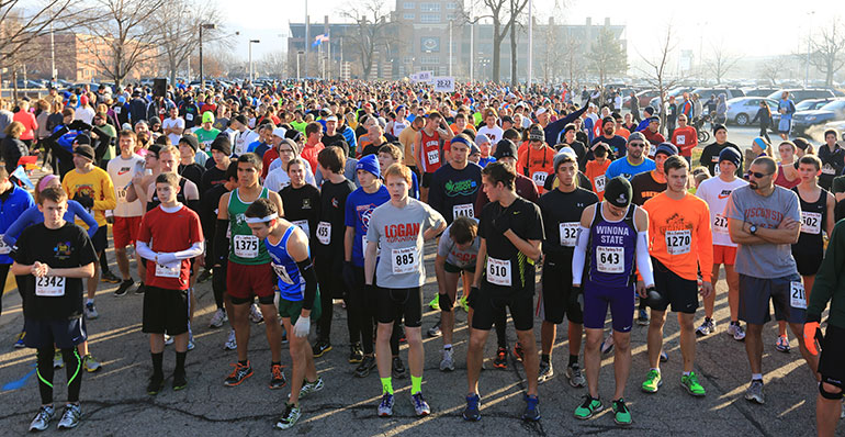TurkeyTrotCrowdW Crowd getting ready to run in race.