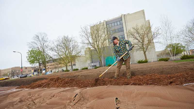 Ashley Halverson of Coulee Region Ecoscapes spreads mulch while helping build a victory garden at City Hall in La Crosse. The gardens, meant to combat local food insecurity, are supported by research by UWL students Kelly Flynn and Joe Rampolla.
Read more →