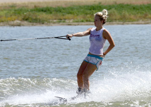 WaterSki4 Claire Oslund, water ski team member, trick skiing.