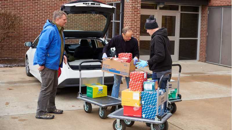 From left, Mark Sandheinrich, UWL dean of the College of Science and Health; Scott Cooper, UWL director of Undergraduate Research, and Michael Hoffman, professor of biology, prepare supplies to deliver to Gundersen Health System.
Read more →