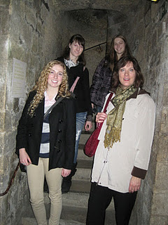 Sharie Brunk, Amy McCubbins, Olivia Cody and Samantha Vanriper are pictured inside the Catacombs, a space below the city of Paris where bones from cemeteries were relocated in the 18th Century.