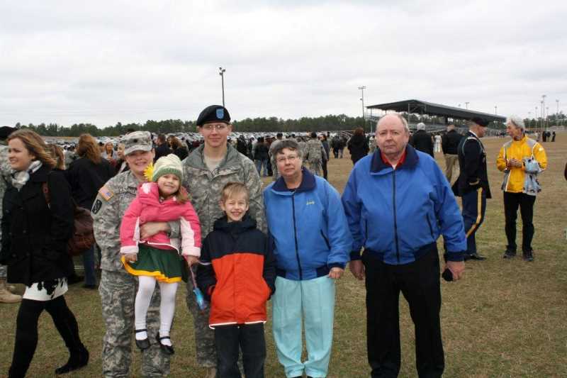 UWL Veteran Education Benefits Coordinator Jane Brannan with her family after her son Joe's graduation from basic training in 2012. From left, Jane Brannan holding her youngest child Jennifer; Joe, oldest son; Jack, middle son; Sandy Brannan, her mother; and James Brannan, her dad. The Brannan Family Student Veteran and Military-Connected Student Scholarship will assist many students with connections to the Armed Forces. 