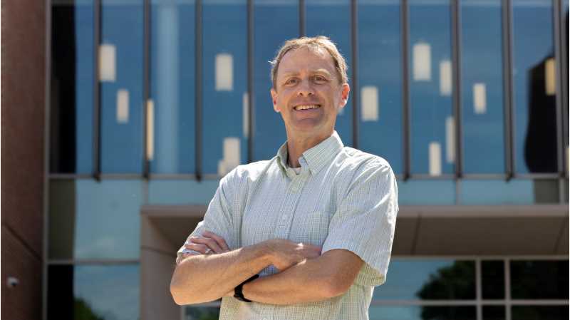 John May, professor of chemistry and biochemistry, is the 2026 recipient of the Eagle Research & Creativity Mentoring Excellence Award.
