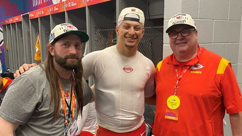 Cale Kirby, a sport management major from 2000-02, left, celebrates with Super Bowl LVII MVP Patrick Mahomes and actor/Chiefs fan Eric Stonestreet after the game. Kirby, an assistant equipment manager for the Chiefs, has attended three of the past four Super Bowls with the team.