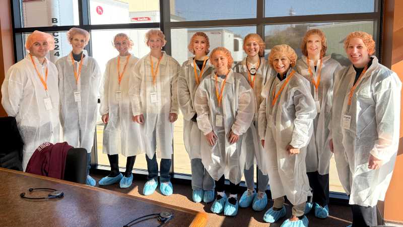 UWL faculty, staff and students tour Kwik Trip Sweets Bakery and labs.
