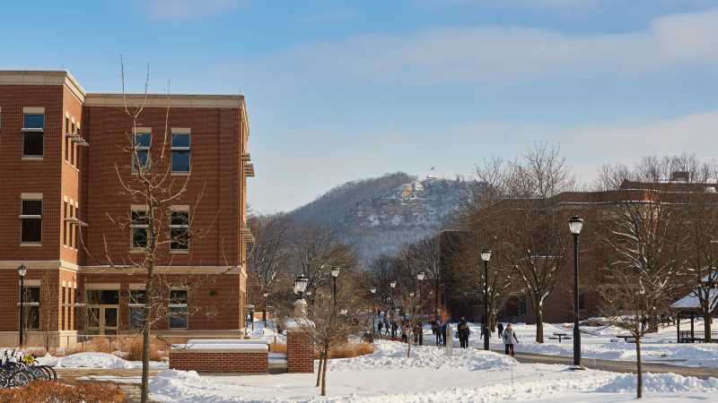 Campus bustles about during a winter day. 
