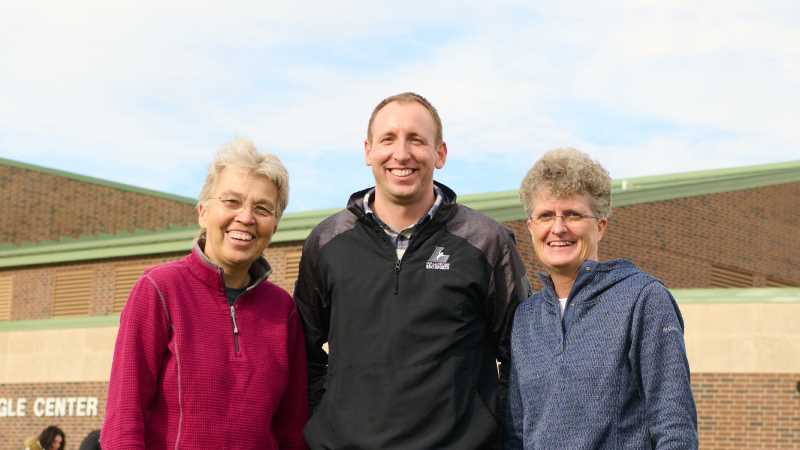 Those gearing up for Rec Sport’s 100th anniversary include, from left, retired Director Sue White, ’85, current Director Jeff Keenan, ’12, and Associate Director Mo McAlpine, ’91. 