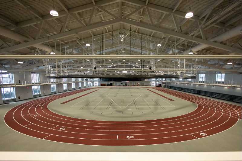 The view of the 200-meter competition track from the upper level. “I am extremely impressed with the new facility. I think it has to be one of the best 200m facilities in the country,” says Bill Schroeder, ’93, who spent a decade as an NFL wide receiver, including several years with the Green Bay Packers.