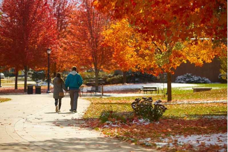 Two people walking on the UW-La Crosse campus