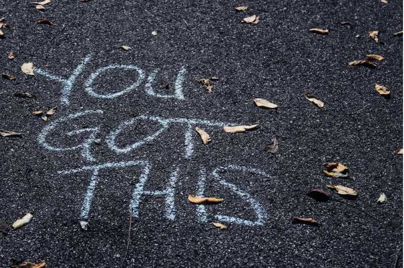 You Got This - is written with chalk on pavement.