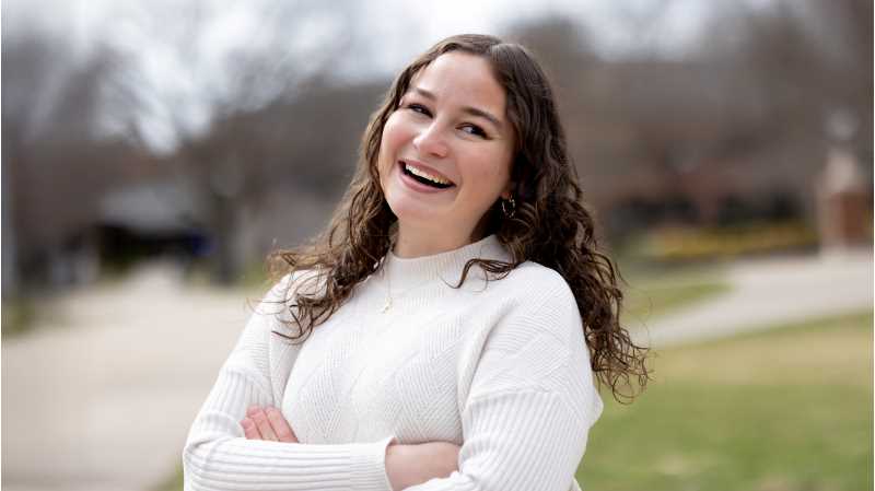 Junior Ellie Baudry serves as a graphic designer for UWL's Center for Organizations, Vision & Engagement. The role has allowed her to strengthen her design skills while building meaningful relationships on campus.