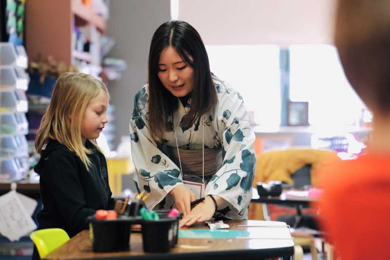 Students from Japan visited K-12 schools in La Crosse and taught students origami and Japanese calligraphy. (Photo credit: School District of La Crosse)