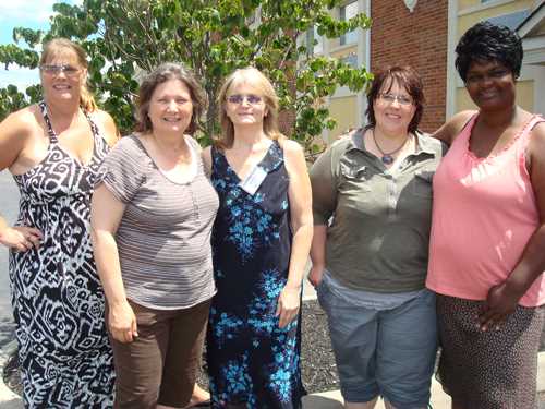 UWL Self Sufficiency Program graduates pose with Andrea Hansen, executive director of the Self Sufficiency Program. From left, Barb Pollack, Hansen, Sherri Swan, Susan Fabian and Kennesha Winslow.