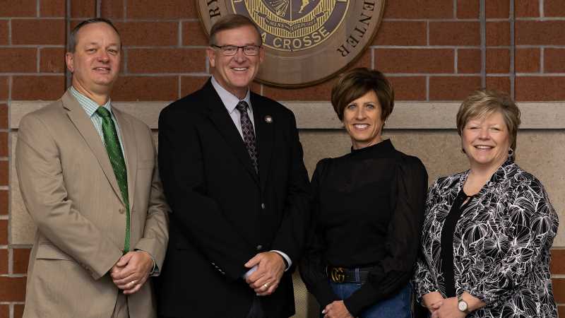 The UWL Foundation and the UWL Alumni Association will come together July 1, 2023, to form the University of Wisconsin-La Crosse Alumni & Friends Foundation. Leadership for the new organization will include, from left, Greg Reichert, vice chancellor of Advancement and president of the UWL Foundation; Todd Taylor, ’80; Lynda Kohler, ’83; and Janie Morgan, ’85 & ’86, executive director of strategic engagement.