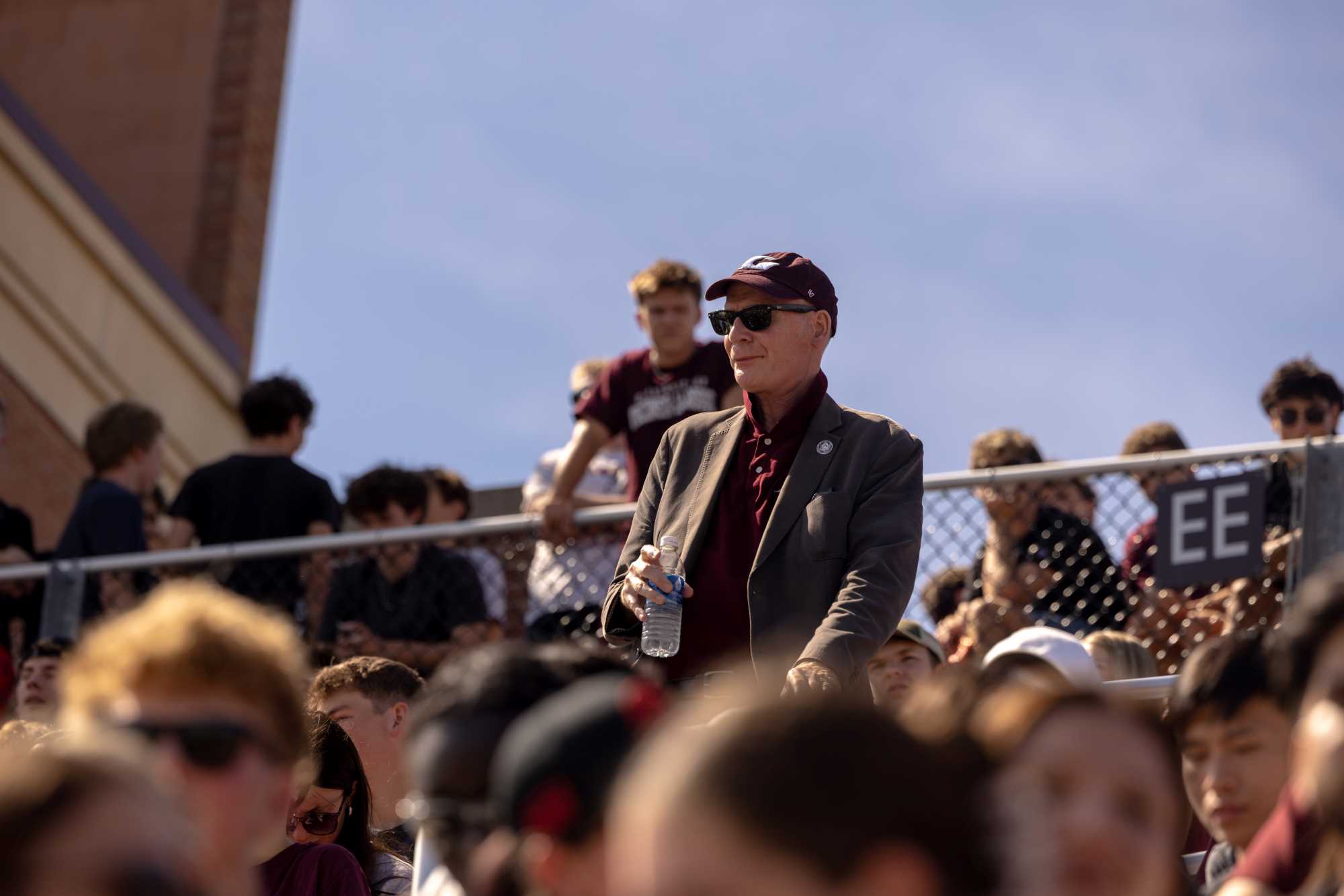 Chancellor Beeby in the student section at UWL football game