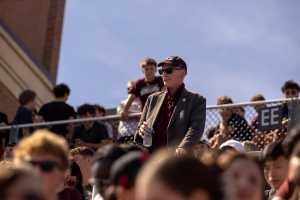 Chancellor Beeby in the student section at UWL football game