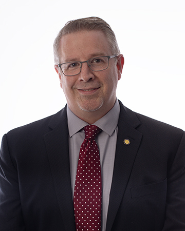 Dr. Martin I. Gaines, Conductor