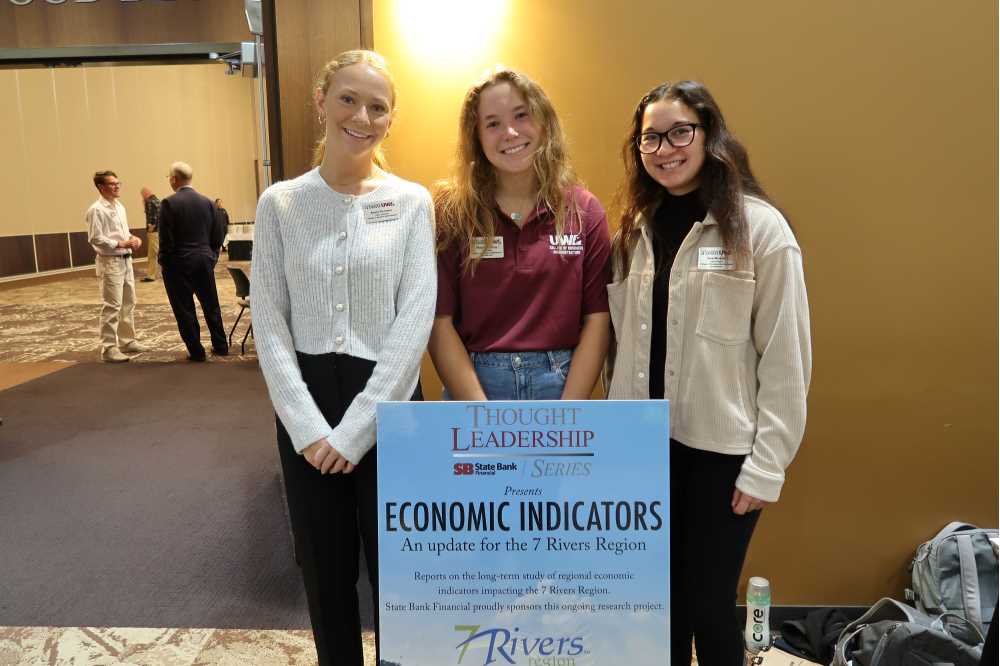 Student workers at Fall 2024 Economic Indicators Event