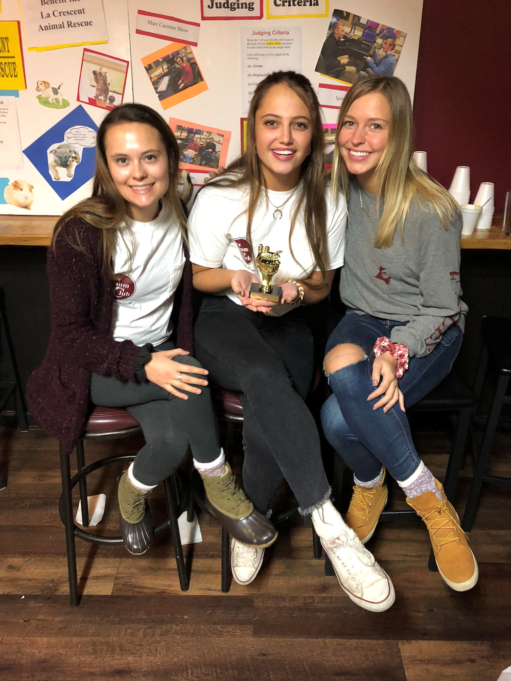 In 3rd Place: Sarah Schimpf, Sabrina Ruffalo and Skylar Fox representing the COMM Club.