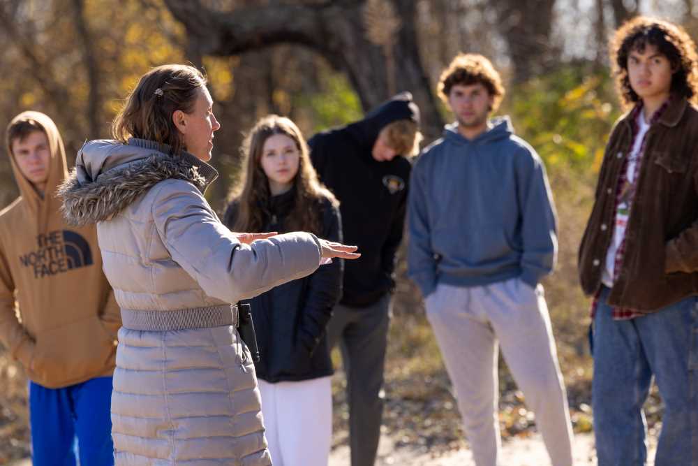 Students walking with Alysa.