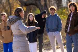 Students walking with Alysa.
