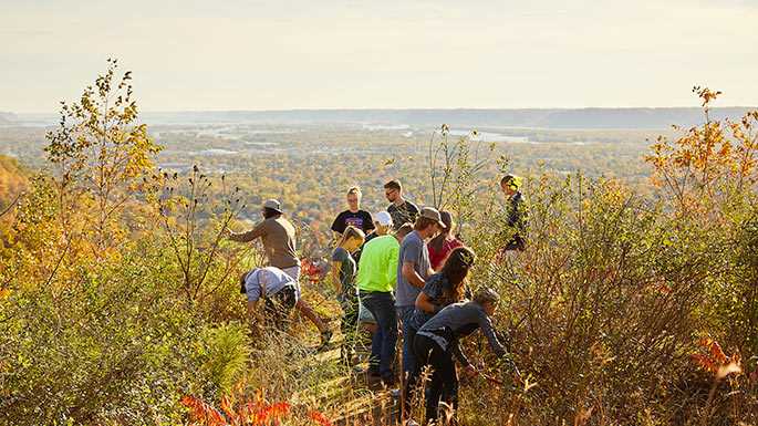 Students hiking in the bluff