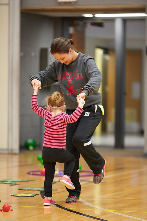 Motor Development program student dancing with a child