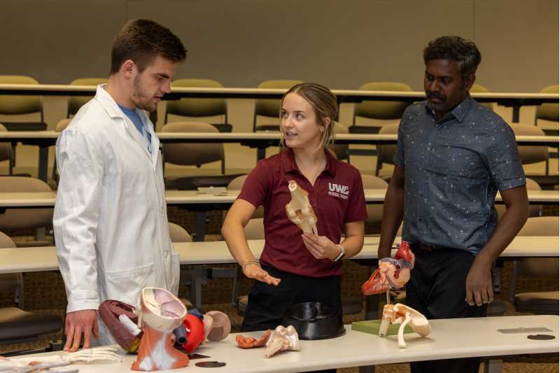 Physical Therapy Graduate Program professor and student discussion.