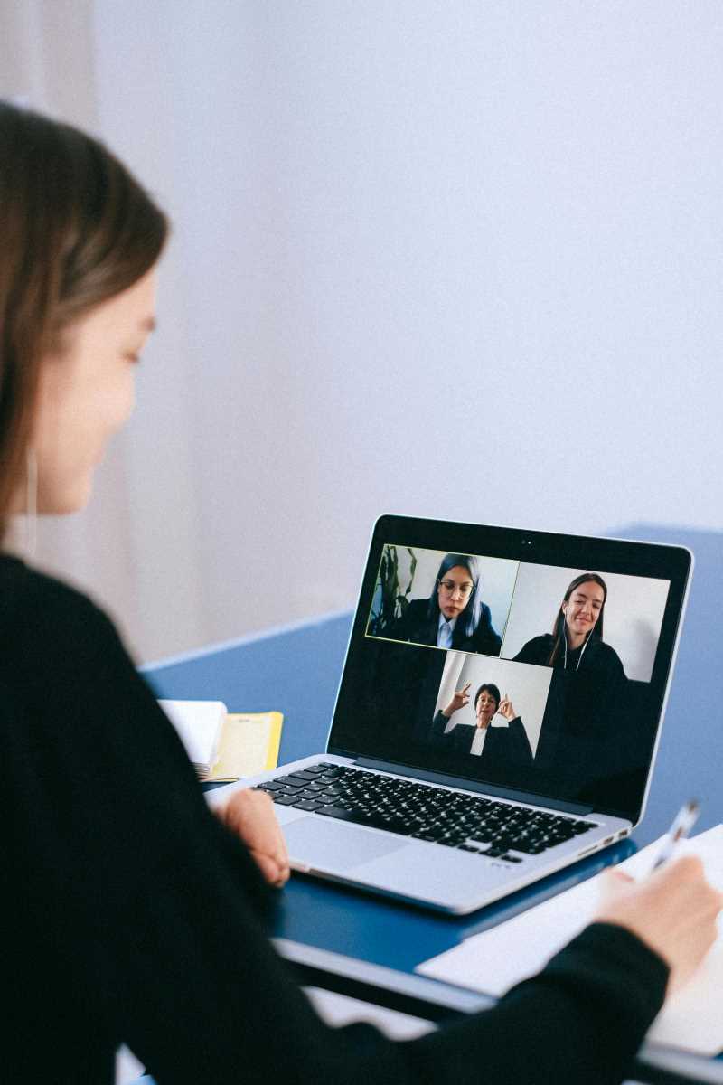 People in an online video meeting