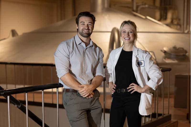 UWL Alumni and City Brewery employees in brewing area.