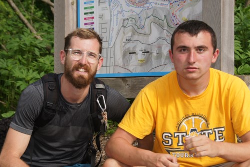 A young man and his mentor hike Hixon trail.