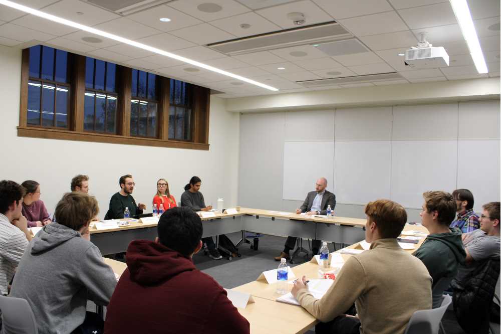 Colloquium participants in discussion.