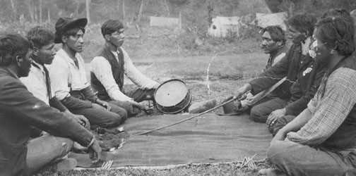 Moccasin game with Jim Eagle, David Hill, Jim DohoHok, Frank Ro and Frank Eagle Smith