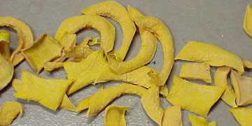 Compare the dry squash to the freshly cut squash. The dry squash is ready to store and be used in soups or stews.