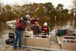 Students on pontoon boat