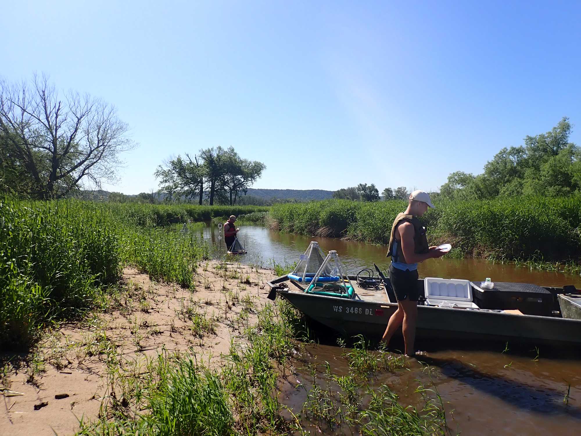 Flat bottom boat on shore