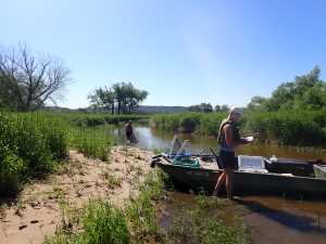 Flat bottom boat on shore