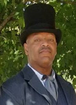 Darrell Ferguson portrays George Edwin Taylor 