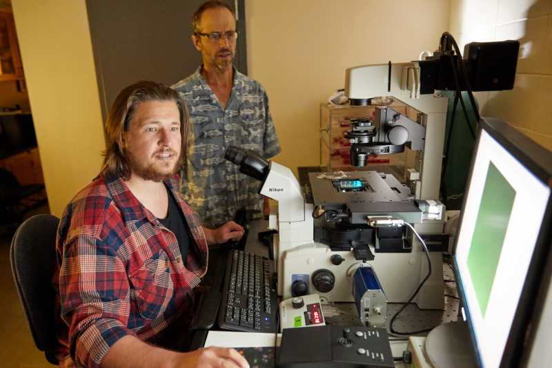 2017 image of UWL faculty Scott Cooper and Tanner.