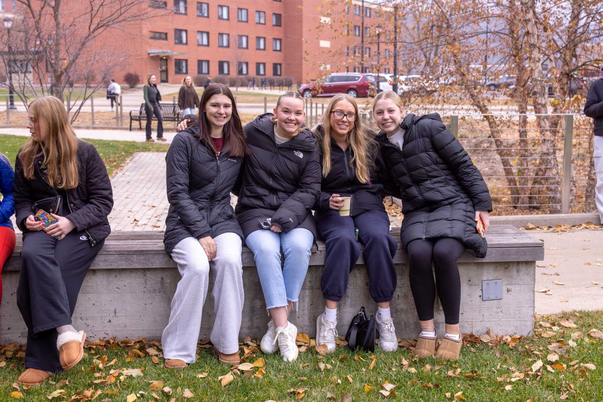 A group of students waiting for the Campus Holiday Tree Lighting.